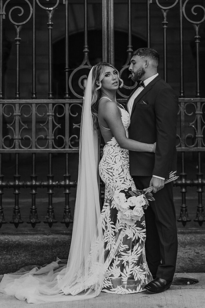 City Hall frames the perfect shot as Danielle and Dominic create a timeless moment, capturing the essence of their Philadelphia love story.