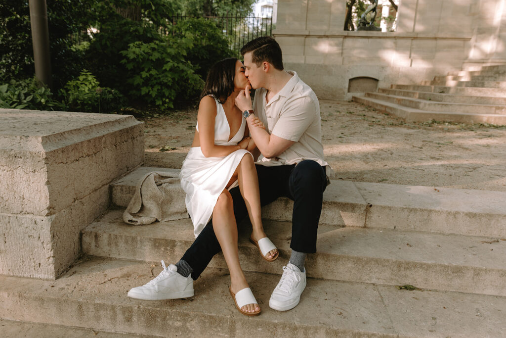 couple kissing at Rodin Museum for their engagement photos in Philadelphia