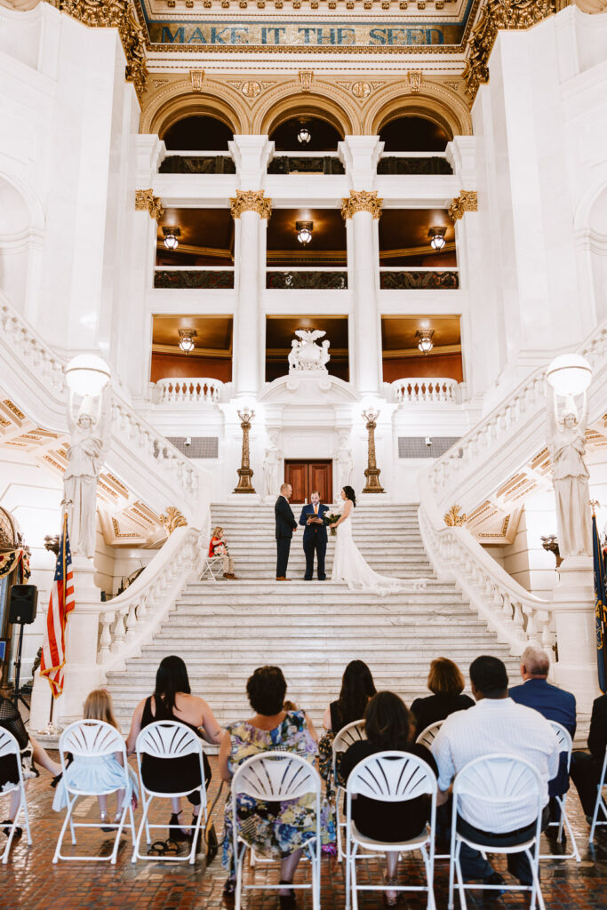 bride and groom during wedding ceremony at the Pennsylvania State Capitol for their Pennsylvania elopement